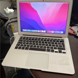 Apple MacBook Air Silver/Black Laptop with Pink Screen Wallpaper